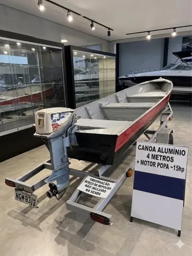 Canoa com motor evinrude 15hp, e berço,todo revisado 