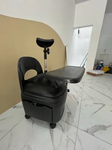 Cadeira de manicure e apoiador