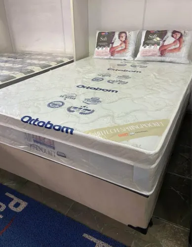 Cama box casal base bege com colchão em molas ensacadas