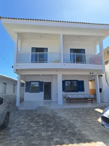 Hospedagem Familiar Pé na Areia - Casa e Apartamentos de Temporada