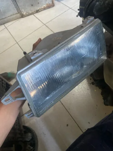 Farol fiat uno frente baixa 