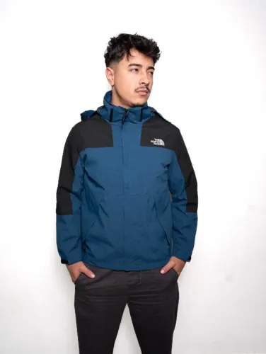 jaqueta corta vento masculina the north face azul escuro e preto