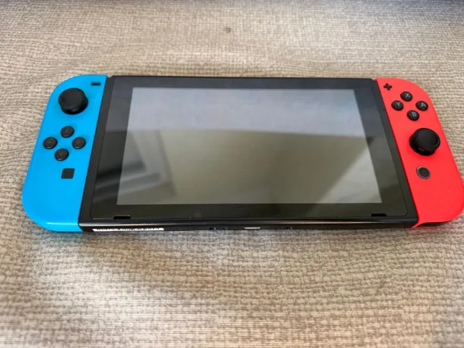 Nintendo Switch Usado + Case, adaptadores pra controle e jogo 