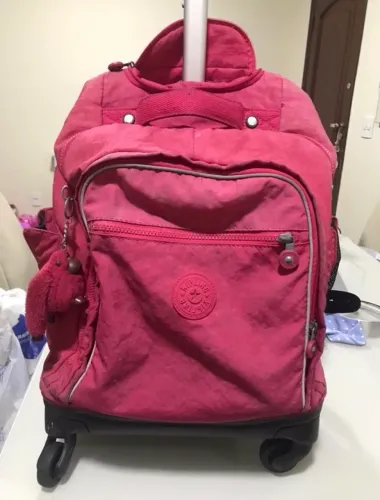 Mochila Kipling original rodinha rosa escuro