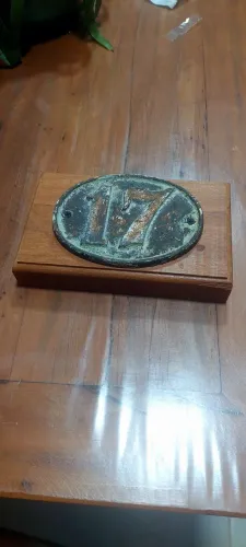 Placa antiga de número de casa