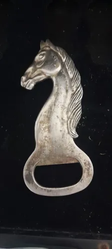 Abridor cabeça de cavalo banhado a prata italiano