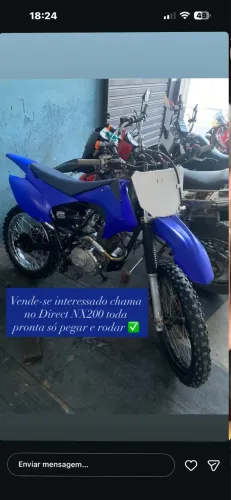 Moto de trilha super NX 200 da presão