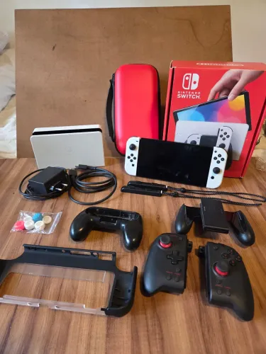Nintendo Switch Oled original + sd sandisk ultra plus 256 gb + acessórios e case duro