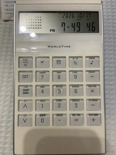 Relógio c hora Mundial com Calculadora e alarme  - com caixa e manual