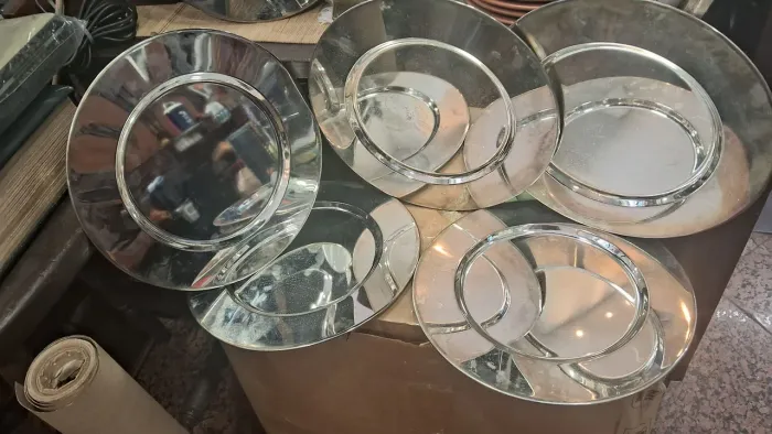 sousplat feitos de aço inoxidável polido conjunto 