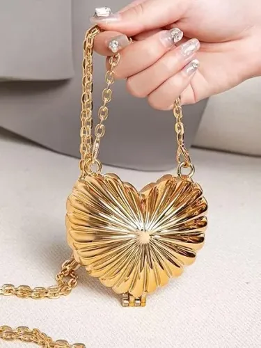mini bolsa de metal coração dourado