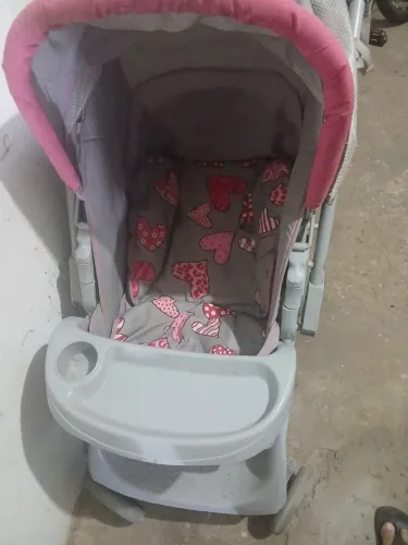 Carrinho de bebê feminino