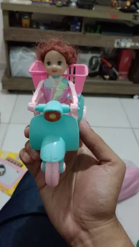 Boneca na moto