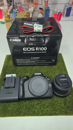 Câmeras Canon R100+lente kit NOVA