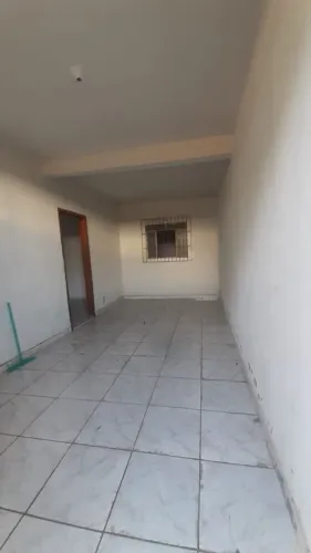 CASA 2 QUARTOS COM VAGA GARAGEM