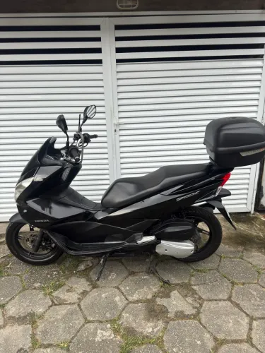 Moto em bom estado de conservação