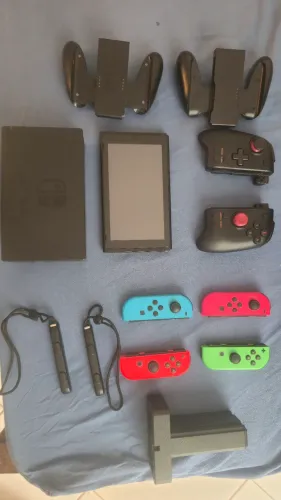 Nintendo<br><br>+ Muitos<br><br>Switch V1<br><br>Desbloqueado<br><br>Acessórios