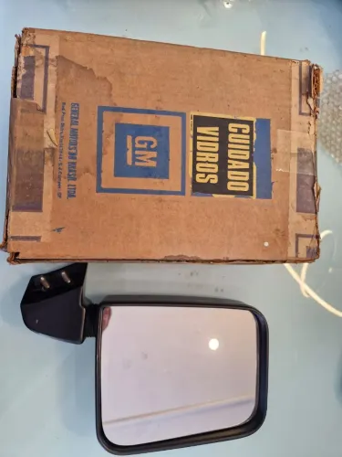 Espelho retrovisor lado direito D 10 D20 ano 85 a 91