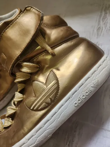 Tênis Adidas original Dourado<br>L 1,33