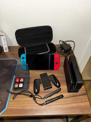 Nintendo Switch OLED + 4 Jogos Físicos + Case + Acessórios