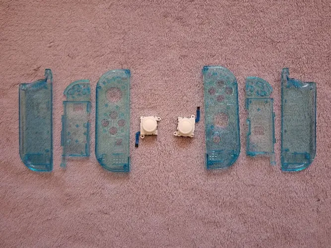 Carcaça para JoyCon, Azul transparente e Analógicos brancos, Nintendo Switch