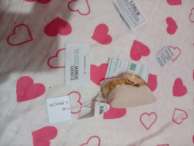 Vendo relógio lince foleado 18k acompanha cordão foleado 18k novos nunca foi usado 