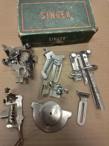 Aparelho de máquina singer pretinha