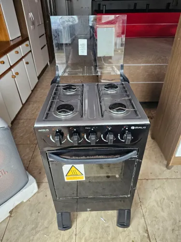 Fogão conservado funcionando perfeitamente no plástico ainda 