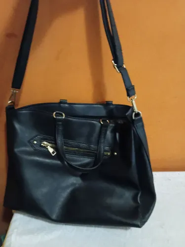 Bolsa couro.