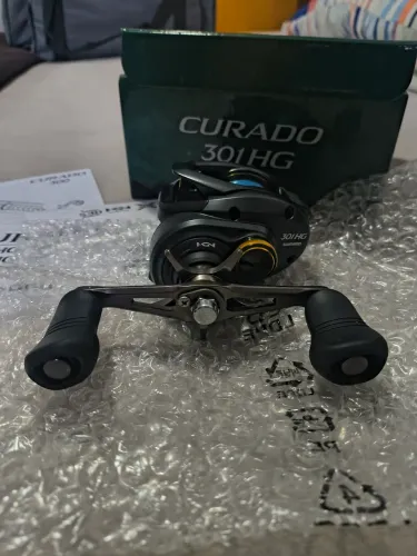 Carretilha Shimano curado 301