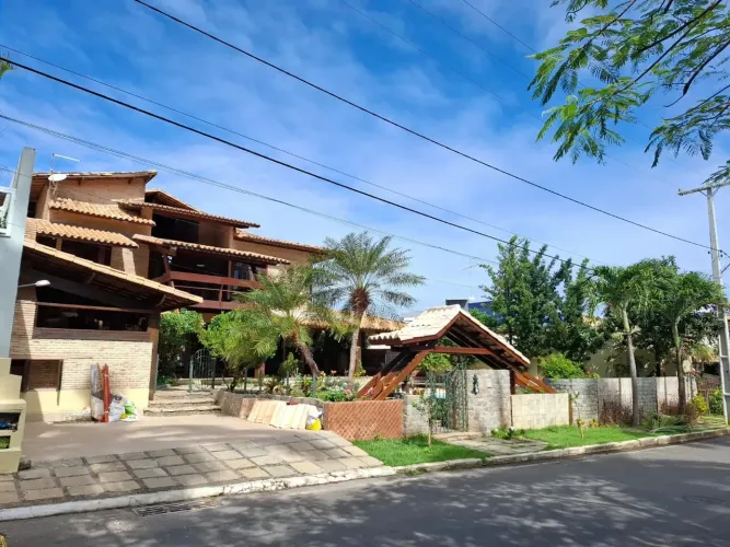 Excelente Casa com 5 suítes no Condomínio Águas do Jaguaribe, 450m², jardins, varanda inte