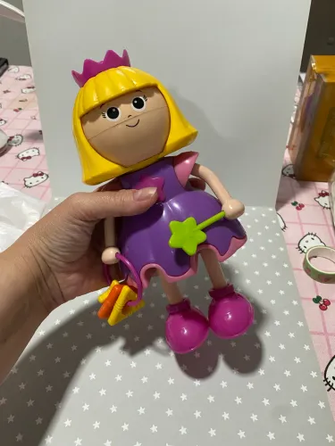 Boneca fadinha Flora - muda a expressão do rosto 