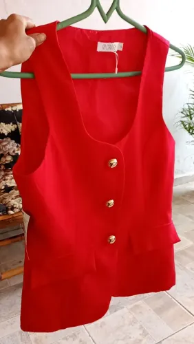 Colete novo $15
