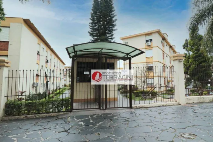 Apartamento com 3 dormitórios para alugar, 69 m² por R$ 1.500,00/mês - Passo d'Areia - Por
