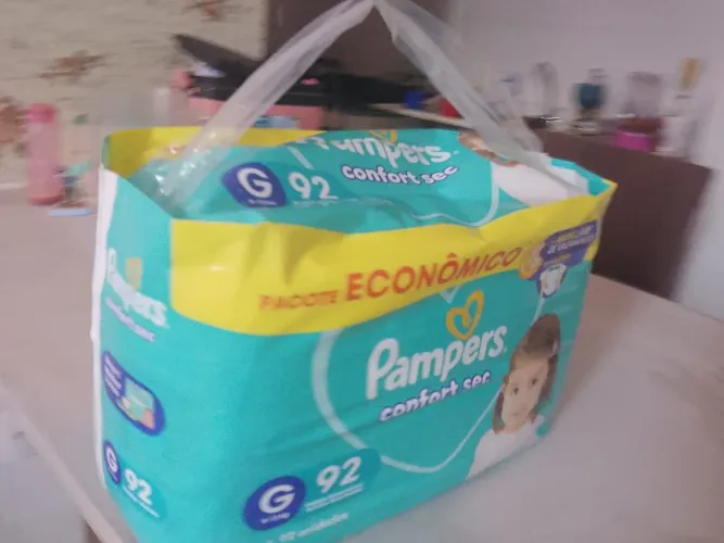 Pacotao com 92 fraudas da Pampers anti vazamento promoção.