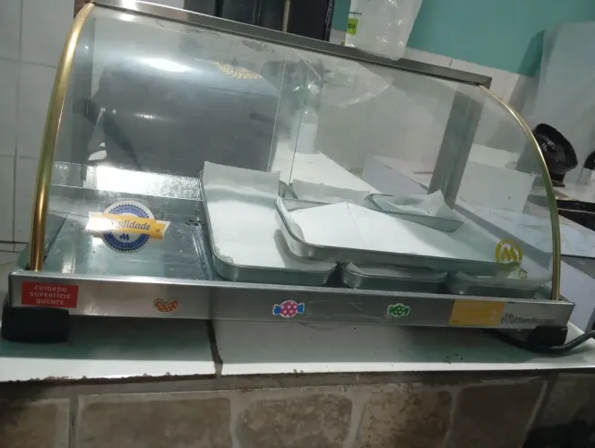 Vendo estufa e fritadeira estado de novo