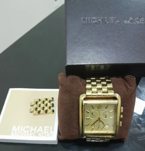 Relógio Michael Kors Mod. 3141 seminovo, dourado.