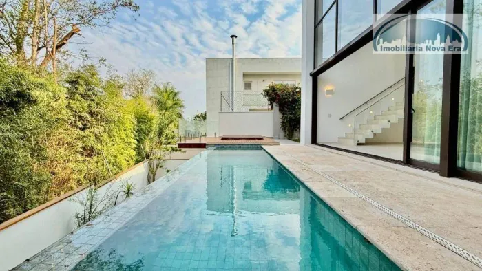 Casa com 5 dormitórios à venda, 429 m² por R$ 5.250.000,00 - Condomínio Reserva das Palmei