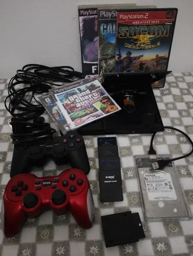 PS2 + HD com jogos + 2 controles + memory card + cds de jogos