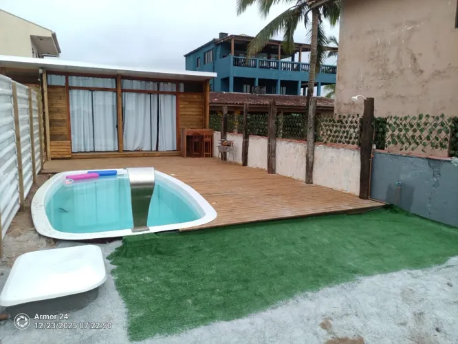 Casa frente mar com piscina em Praia de Leste