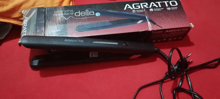 Prancha de cabelo. Cor preta nova. Marca agratto