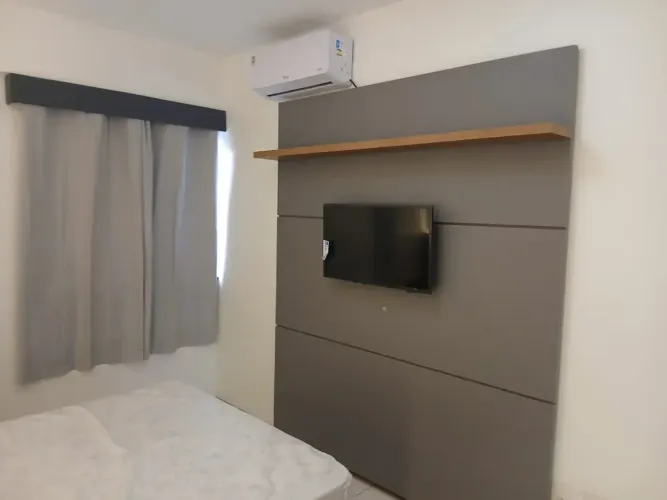 locação flat ao lado da praia