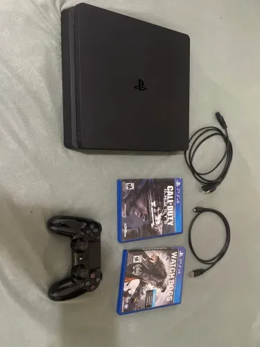 Vendo PS4 e controle seminovo de 1tb + cabos e 2 jogos