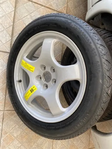 Estepe fino BMW 135/80/17 roda mais pneu novo valor mínimo 