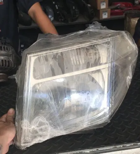 Farol Esquerdo Nissan Frontier Antiga