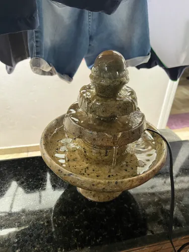 Fonte de água de pedra sabão.