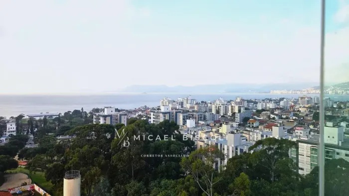 Apartamento vista mar de 120m2 à venda em Florianópolis | 3 dormitórios (2 suítes) | 2 vag