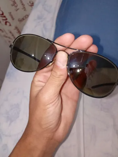 Óculos escuro com pouco grau, da marca(luxottica)