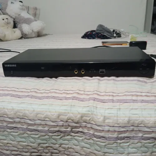 Leitor de DVD com suporte para microfone karaokê