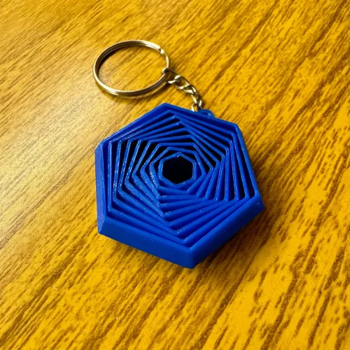Chaveiro Fidget Sensorial Articulado Hexagonal Antiestresse